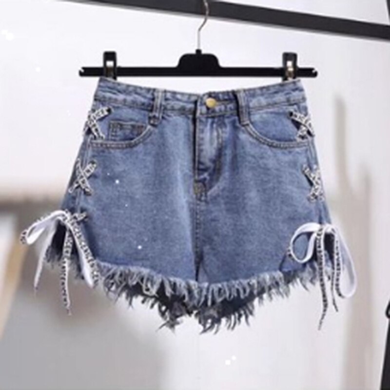black cut up jean shorts