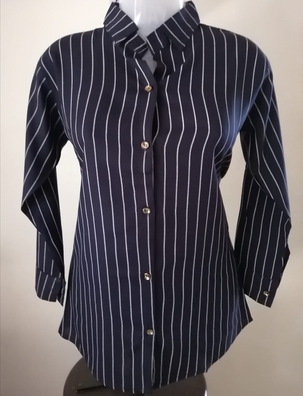 navy blue shirt with white lines