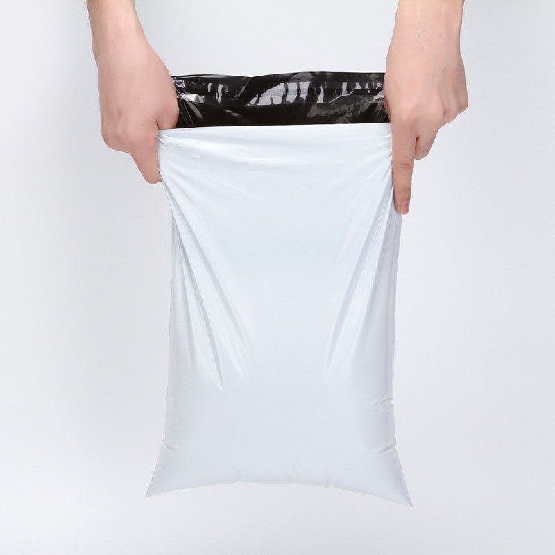 Perfect Small Poly Mailer High Quality White Flyers Bundle of 100, 25, 10 Pcs 500 Bags Thickness 2.2mm Self-seal Adhesive bags Storage Courier Bags 20cm*30cm Mailer Packs Daraz Flyers Postal Safe Mailing Bags Shipping packing bag Size 20cm x 30cm. 