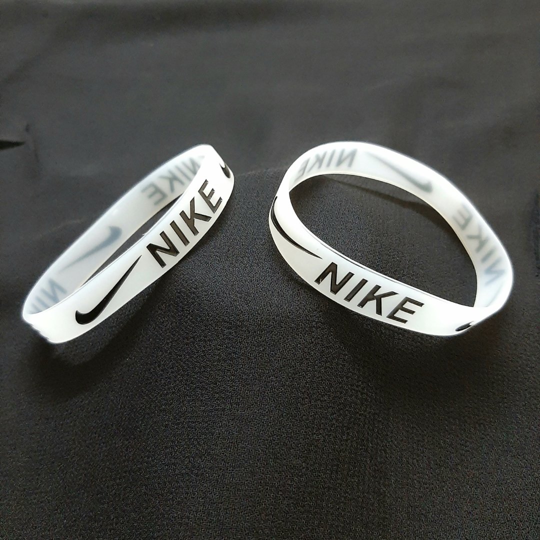 White Luminous Type Free Size Stretchable Silicone Nike Wristband Bracelet For Men Events Party Sports & Daily Wear. 