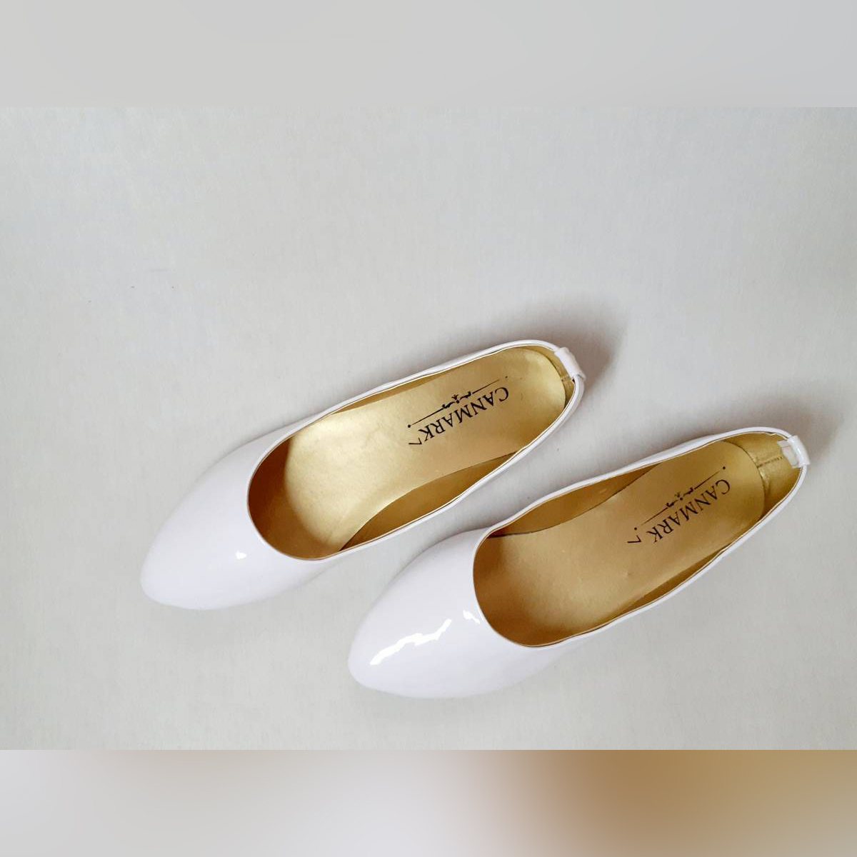 white flat shoes uk