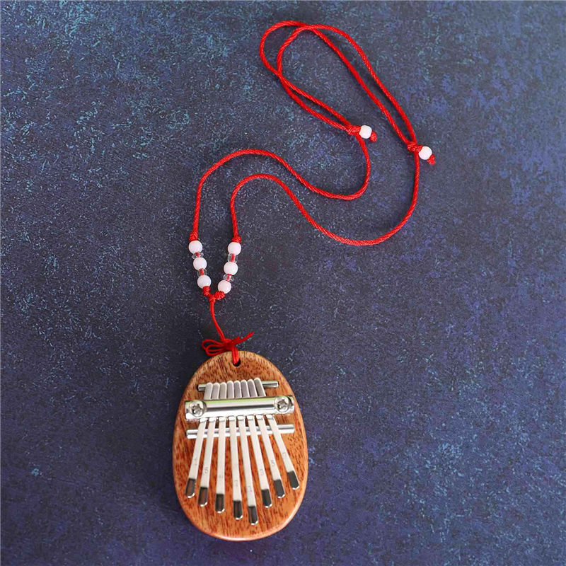 4X 8 Key Mini Kalimba Exquisite Finger Thumb Piano Marimba Musical Good Accessory Pendant Gift. 