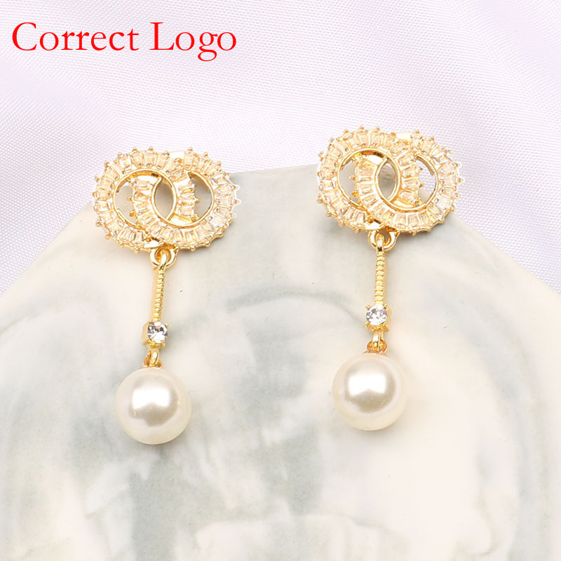 Borla de perlas y circonitas de nuevo estilo, ideal para rostros redondos, pendientes largos de alta calidad que estilizan la figura, únicos y elegantes para mujer._voghion.com