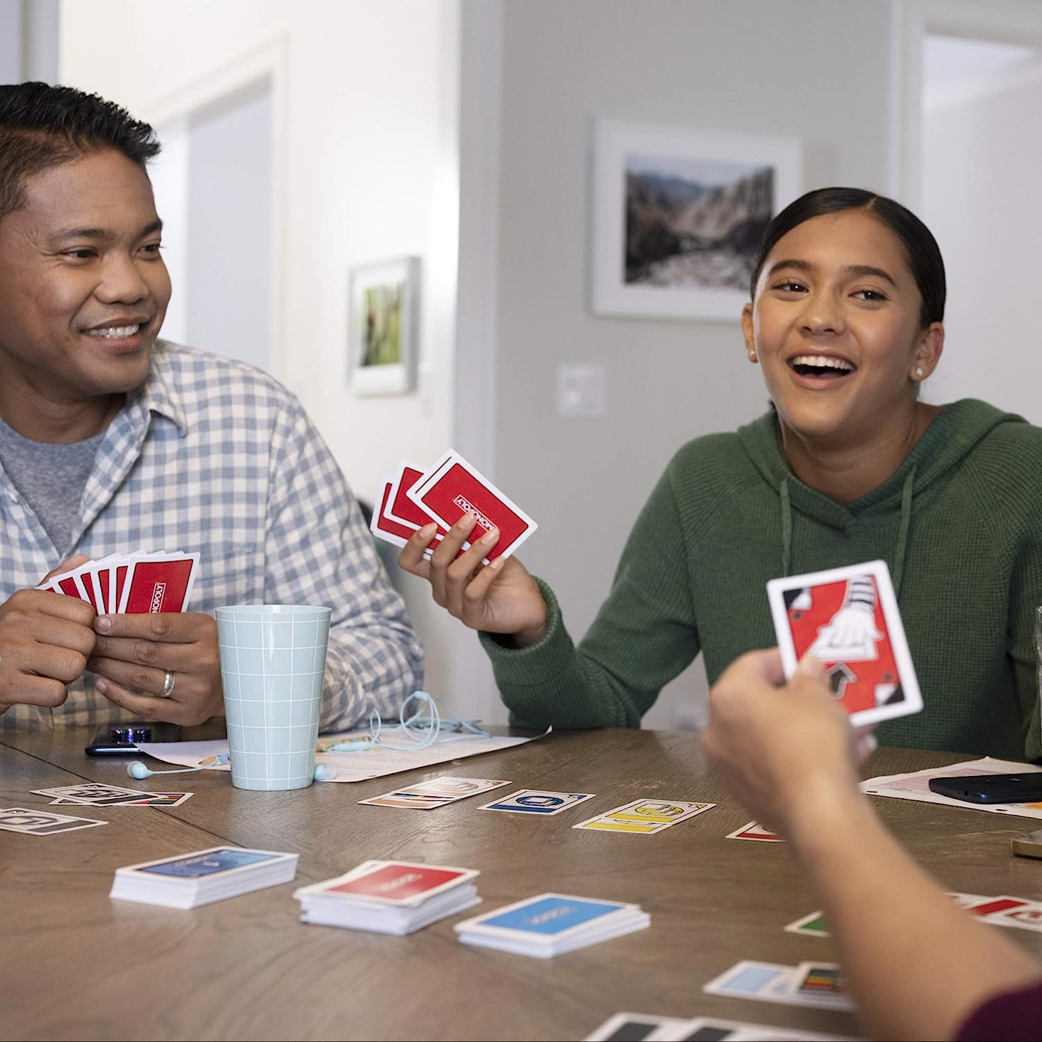 Hasbro Gaming Monopoly Bid Game, Quick-Playing Card Game for 4 Players, Game for Families and Kids Ages 7 and Up. 