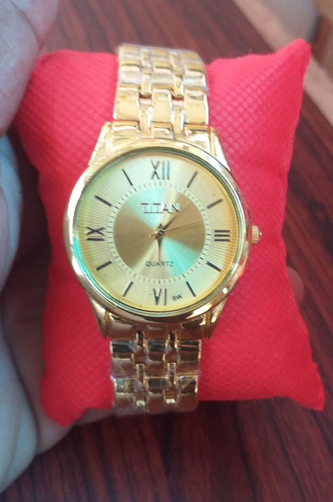 titan gold watch for women