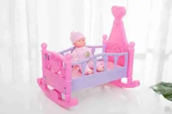 baby doll and cot