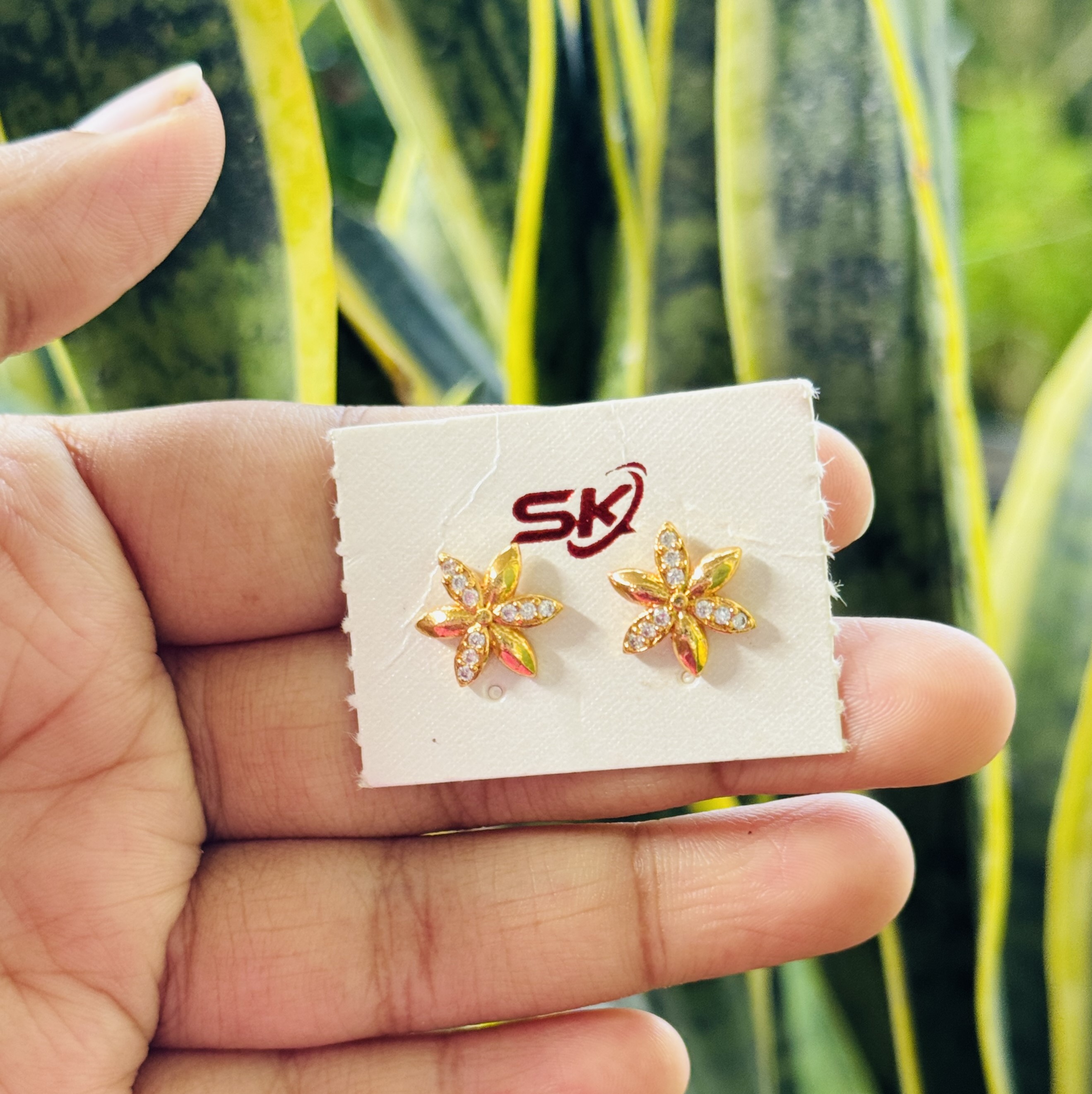 アクセサリー CHAINSAW BLADE AND FLOWER EARRING アクセサリー