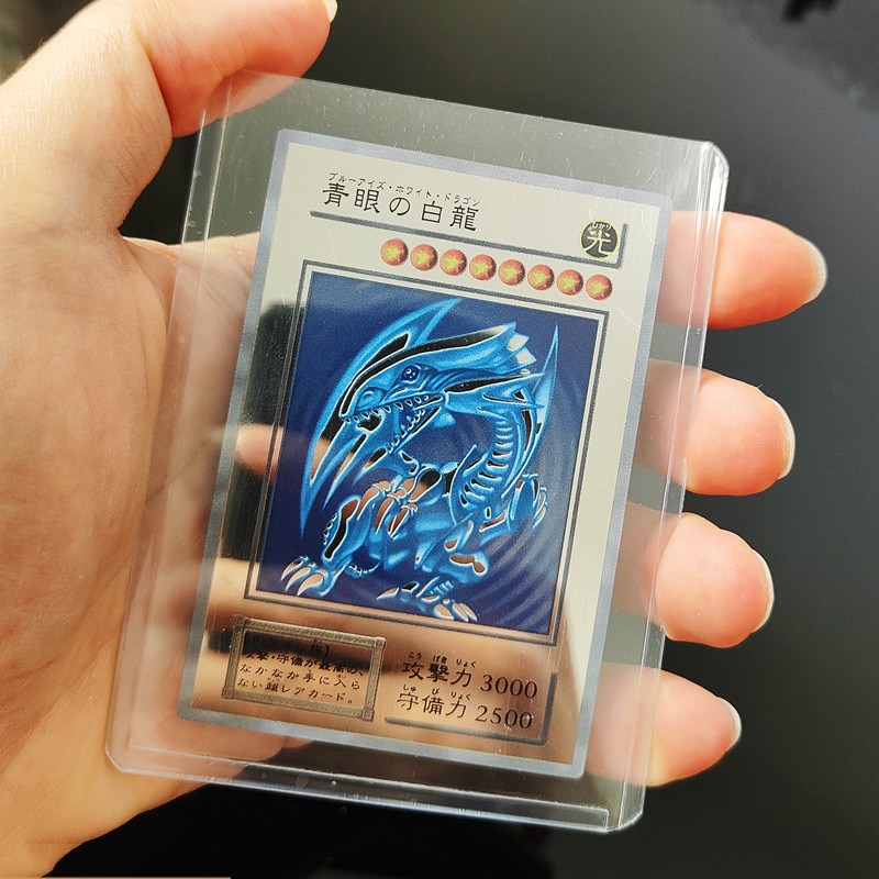 【Hannah Martin Official Store】Yugioh Iron Cards with Yu Gi Anime Cards Blue Eyes Dark Magicial Obelisk Slifer Ra Yu Gi Oh Pokemon Gold Letters. 
