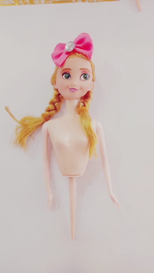 cake doll topper. 