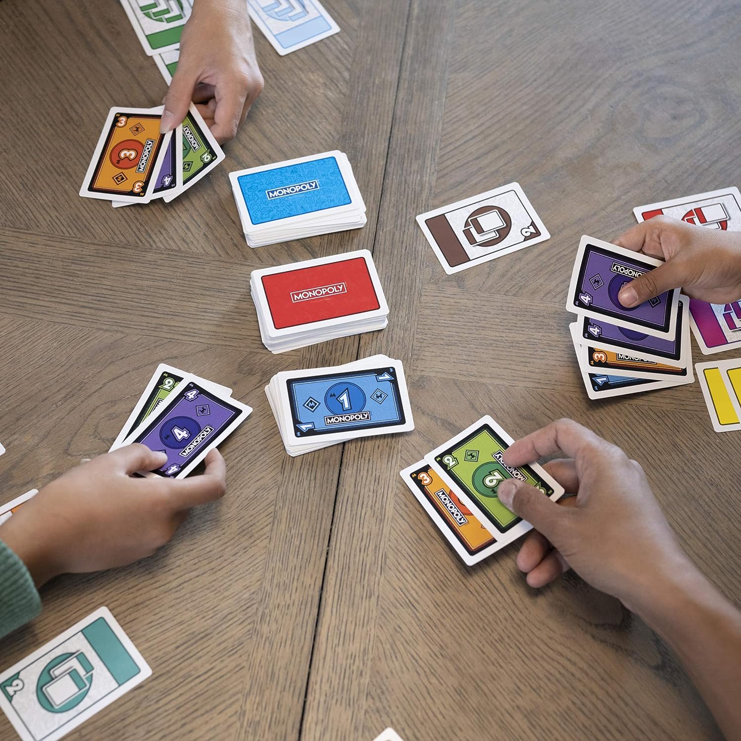 Hasbro Gaming Monopoly Bid Game, Quick-Playing Card Game for 4 Players, Game for Families and Kids Ages 7 and Up. 