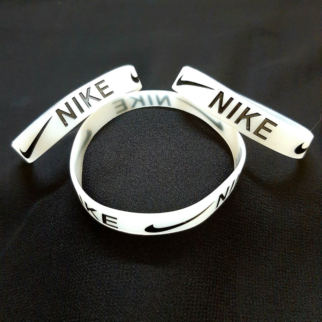 White Luminous Type Free Size Stretchable Silicone Nike Wristband Bracelet For Men Events Party Sports & Daily Wear. 