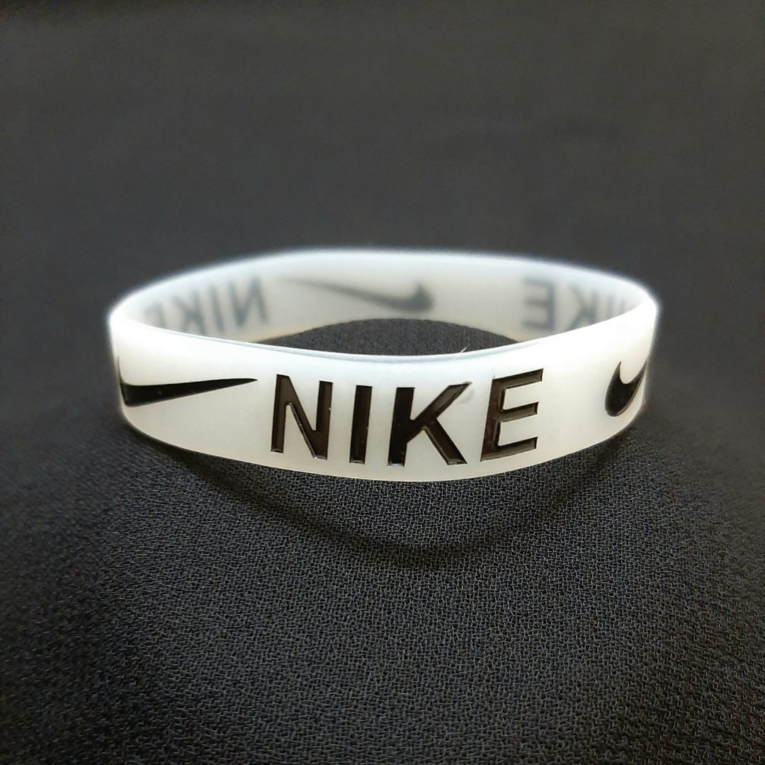 White Luminous Type Free Size Stretchable Silicone Nike Wristband Bracelet For Men Events Party Sports & Daily Wear. 