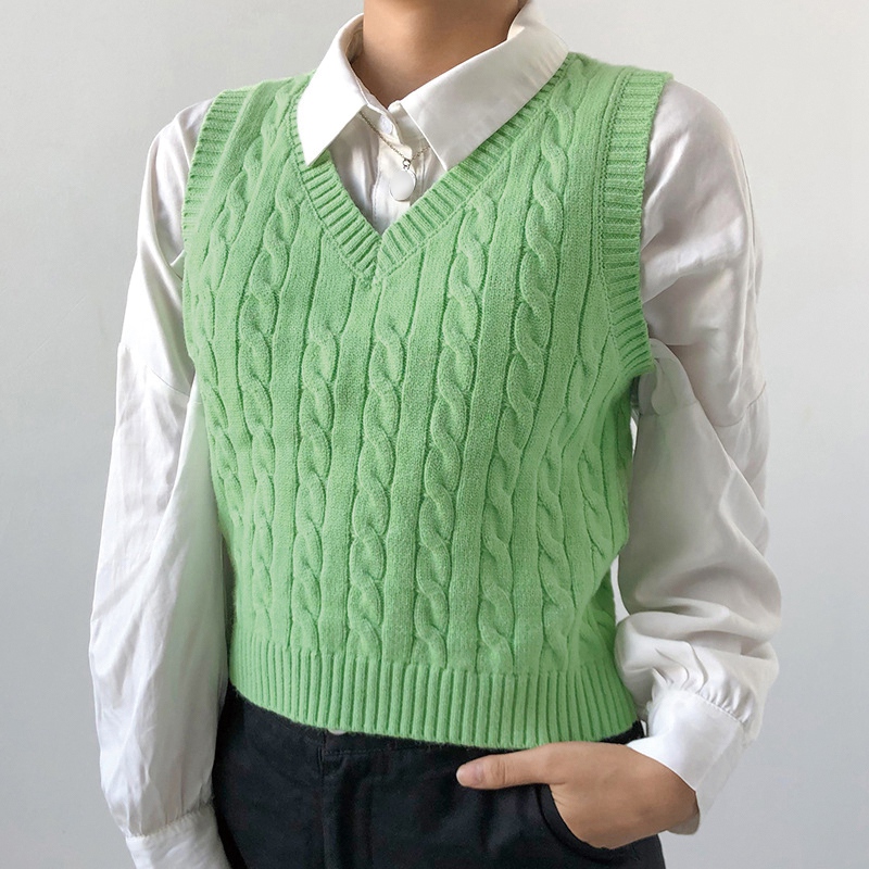 green knitted vest