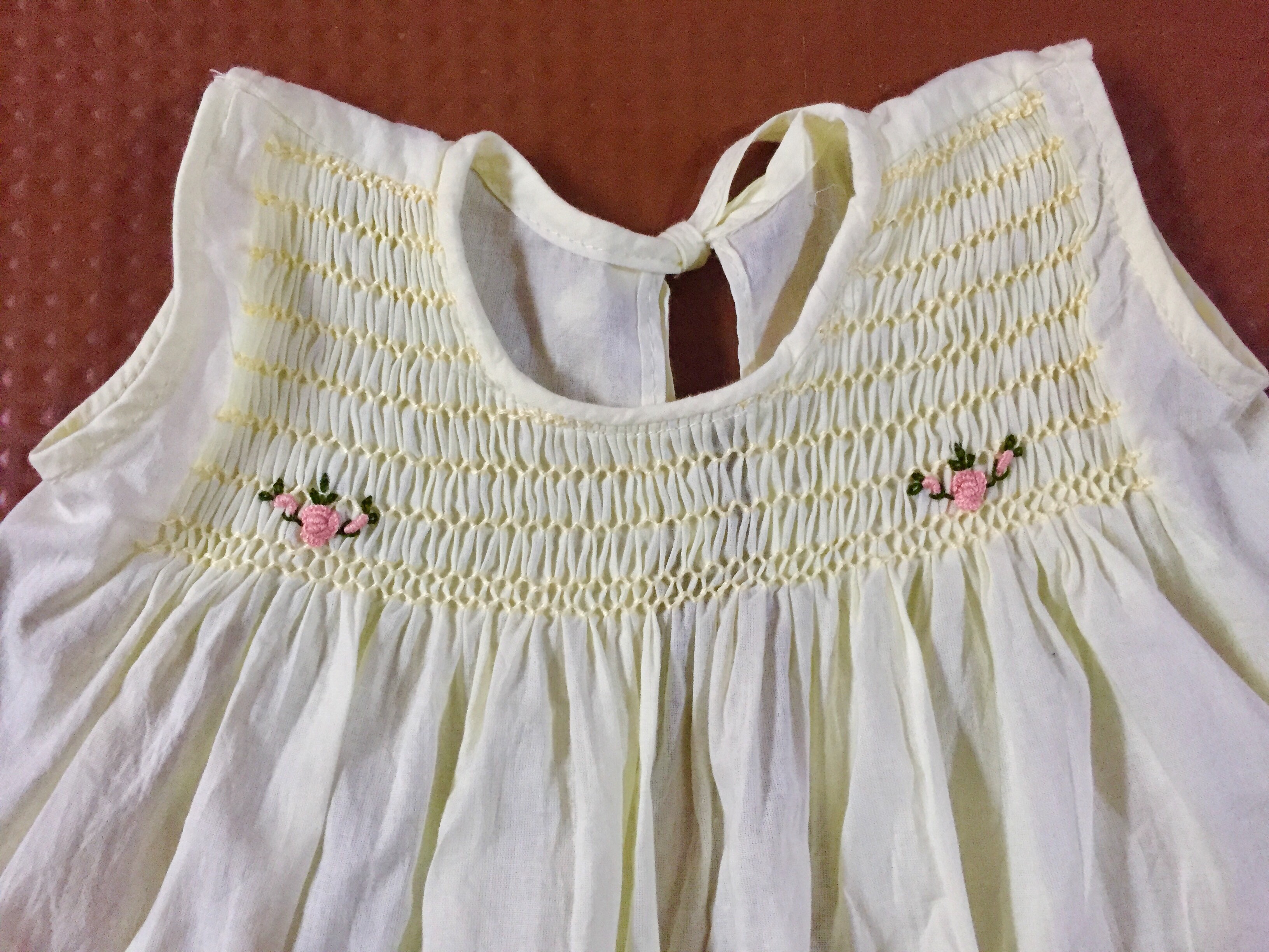 Baby frock smocking outlet designs